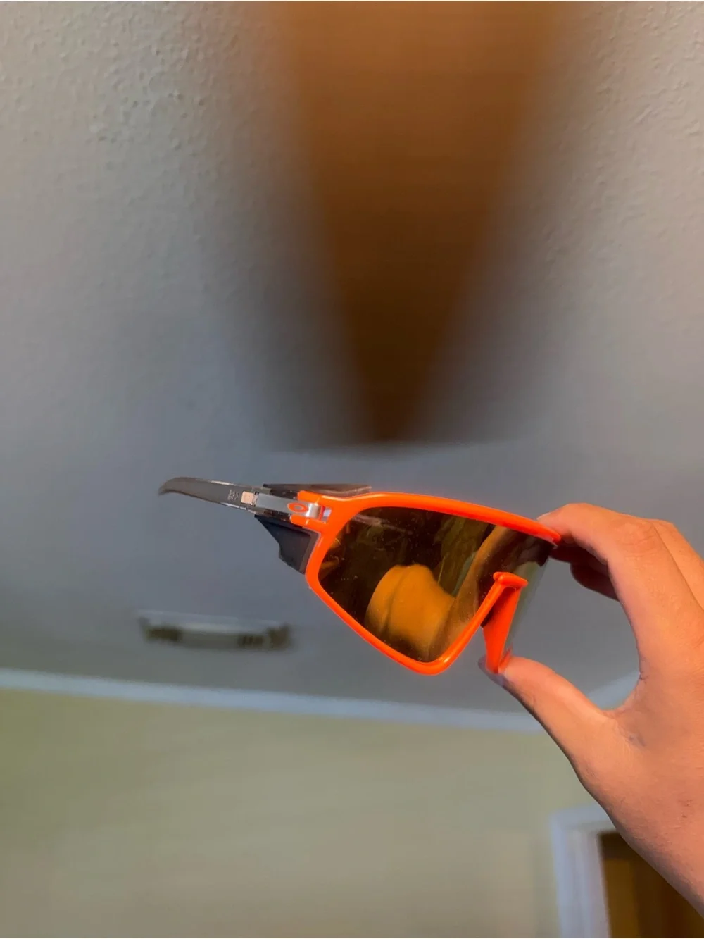 Orange Sport Sunglasses with Mirrored Lenses Oakleys
